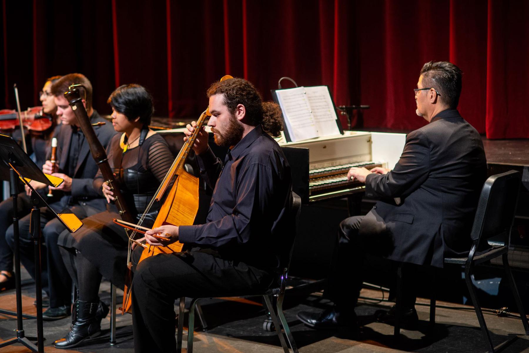 音乐 students performing in an auditorium.