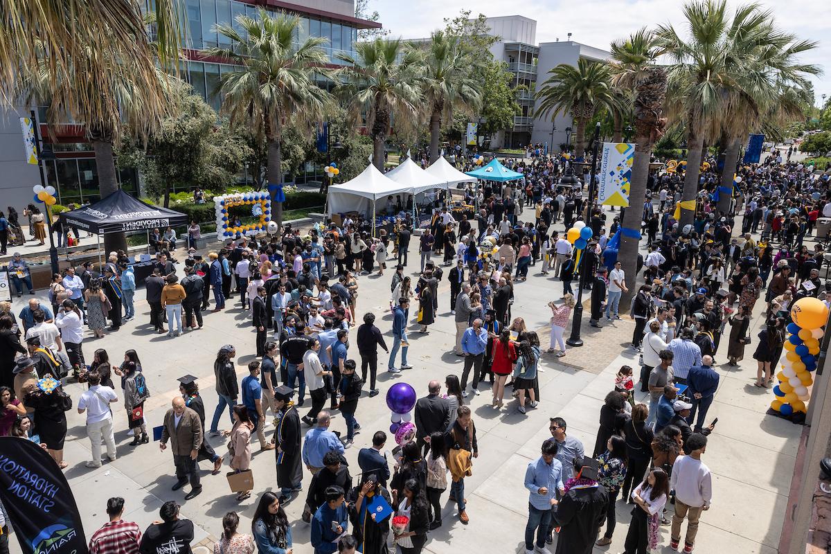 Large crowd gathered at the resource fair on the Paseo