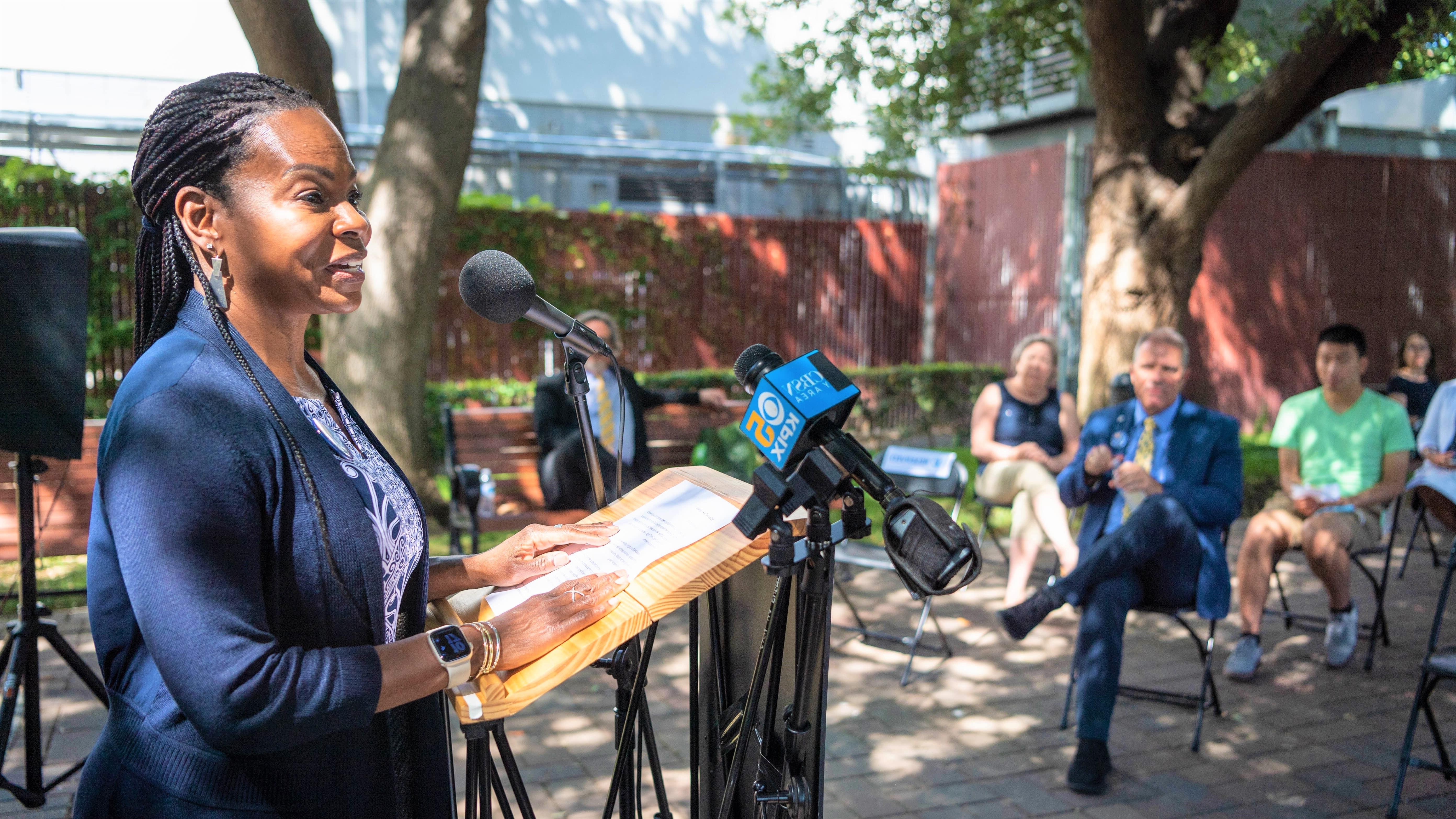 Addressing media at a press conference